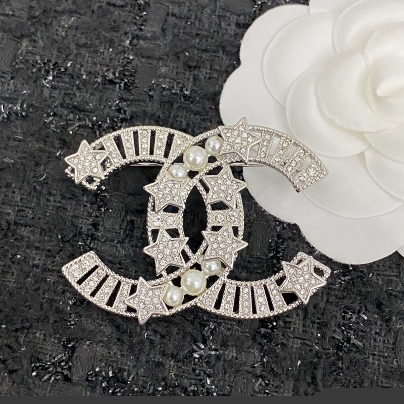 Ch*el brooches